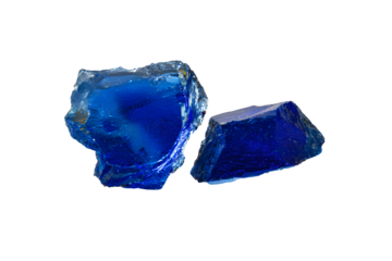 Broken glass blue art on floor isolated on cutout PNG or transparent background. Abstract background with shiny pieces of broken transparent glass on dark surface as concept of fake crystals and gems.