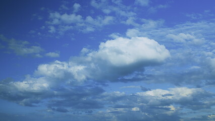 Fototapeta premium A Beautifully Appealing Cloudy Sky Accompanied by a Vivid Blue Background Displayed