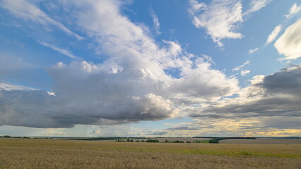 Fototapeta premium The Serene Countryside Under Beautiful and Dramatic Skies That Inspire Peaceful Reflection