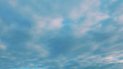 A Serene and Cloudy Sky Featuring a Beautiful and Captivating Display of Vibrant Hues and Colors