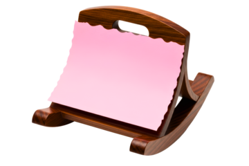 Wooden rocking blotter with pink paper sheet on the bottom surface on a transparent background