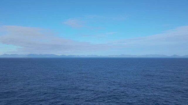 Gimbal panning shot from a moving ship of Vancouver Island while cruising in the Pacific Northwest. 4K at 30 FPS