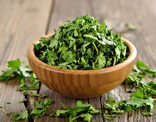 Close-up of chopped green herbs in a wooden bowl on a rustic surface