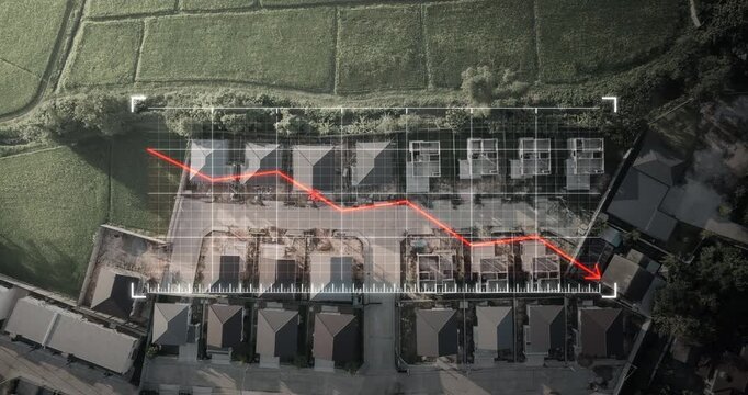 Top down aerial view of residential house construction site overlaid with downward trend graph, symbolizing declining market value, reduced demand and economic slowdown in real estate sector.