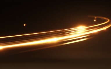 Abstract golden light trails on dark background dynamic motion effect