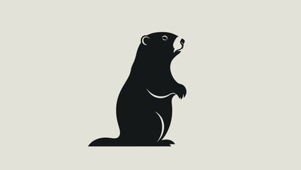 Obraz premium Black silhouette of a standing groundhog, a cute and curious rodent, on a light background.