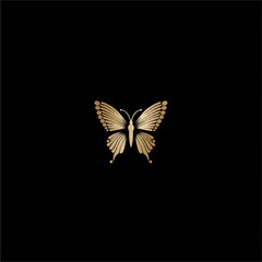 Elegant golden butterfly isolated on black background design element