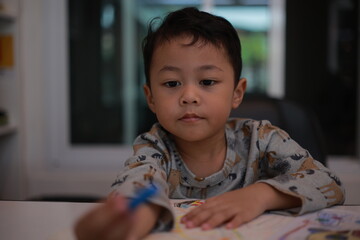 little boy playing with toy