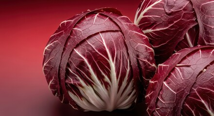 Radiant red radicchio heads against a vividly colored backdrop arrangement