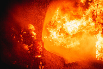 Dramatice Night Operation: Firefighting Squad Extinguishing a Blazing Inferno