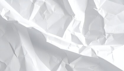 Close-up of crumpled white paper, showing shadows and texture