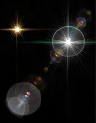 Bright lens flares and starbursts against a black background