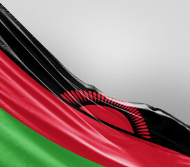 Malawi flag waving on grey background. Malawi nationalflag for independence day.