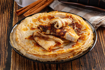 Thin homemade golden pancaces stack