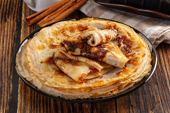 Thin homemade golden pancaces stack
