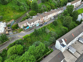 High Angle Drone Camera Footage of Swansea City Centre Near Coastal Beach During Sunny Day of July 14th, 2025. Swansea is Most Beautiful, Modern City and county on the south coast of Wales, UK