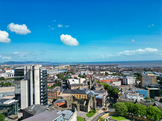 High Angle Drone Camera Footage of Swansea City Centre Near Coastal Beach During Sunny Day of July 14th, 2025. Swansea is Most Beautiful, Modern City and county on the south coast of Wales, UK