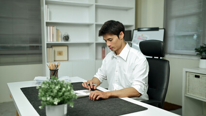 Audit concept,Bookkeeper or financial inspector and secretary making report Financial Planning Report in Spreadsheet