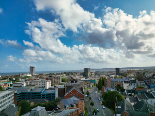 High Angle Drone Camera Footage of Swansea City Centre Near Coastal Beach During Sunny Day of July 14th, 2025. Swansea is Most Beautiful, Modern City and county on the south coast of Wales, UK