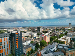 High Angle Drone Camera Footage of Swansea City Centre Near Coastal Beach During Sunny Day of July 14th, 2025. Swansea is Most Beautiful, Modern City and county on the south coast of Wales, UK