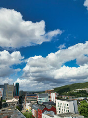 High Angle Drone Camera Footage of Swansea City Centre Near Coastal Beach During Sunny Day of July 14th, 2025. Swansea is Most Beautiful, Modern City and county on the south coast of Wales, UK