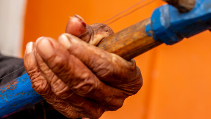 Oldman playing rebab music instrumental