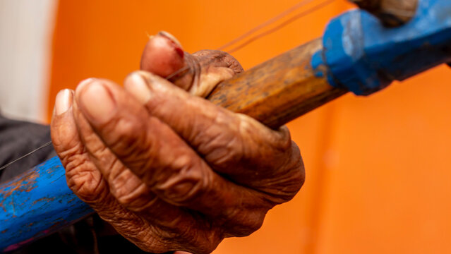 Oldman playing rebab music instrumental