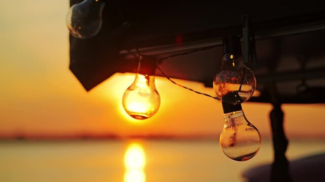 Rooftop tent, Daugava river, glowing string lights creating romantic sunset mood
