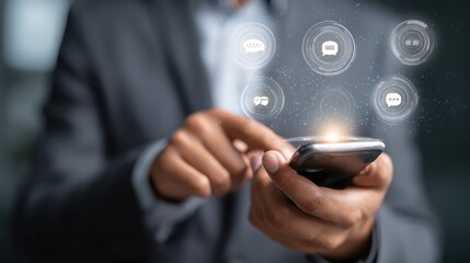businessman engaged with chatbot interface on smartphone modern office setting with glowing digital icons conveying futuristic communication and automation in professional