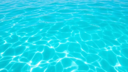 Bright turquoise water surface with sunlit ripples and reflections texture