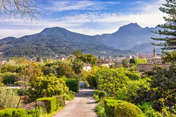 View at S&oacute;ller a village in a valley by high mountains in Mallorca