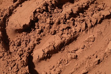 Fototapeta premium Natural cocoa powder as background, top view