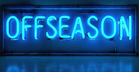 Obraz premium Bright blue neon sign spells OFFSEASON. Dark background creates strong contrast, highlighting glowing letters. Simple, direct message.