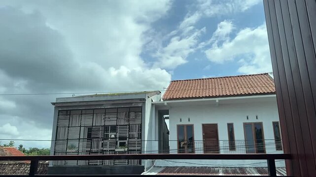 Time lapse Architectural contrast under a bright blue sky with. Time-lapse clouds video