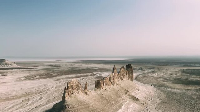Mount Bozzhira, Mangystau. View of the cliffs of the Ustyurt plateau in Western Kazakhstan. Beautiful white rocks in the endless white valley of Mangystau region.Rock formations of the Bozzhyr valley.
