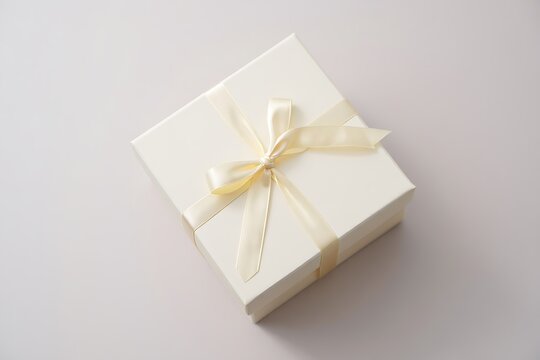Elegant white gift box with bow