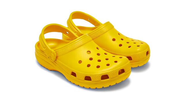 Yellow rubber clogs footwear isolated on white background