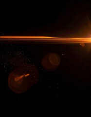 Bright orange light streak across black, with lens flare and particles