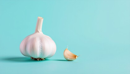 Minimalist garlic bulb and clove composition set against a serene light blue canvas