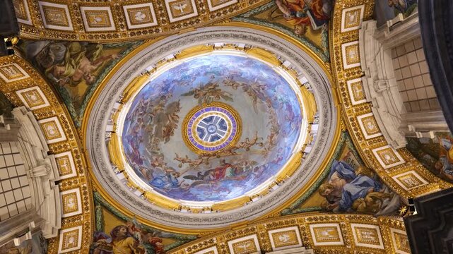 circular perspective interior dome saint peter's basilica intricate paintings latin inscription encircling central oculus artistic detail renaissance art vatican city sacred space 