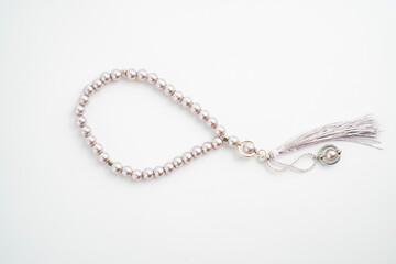 Prayer beads on a white background