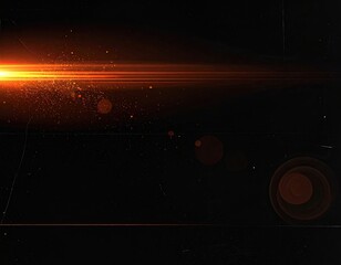 Abstract orange light burst with lens flares against a textured black backdrop