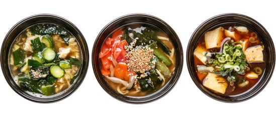 Three sets of Japanese winter soup meals with tofu, seaweed, and vegetables on transparent background