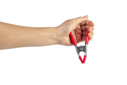 A studio shot of a red stainless spring clamp in hand isolated on a transparent background - Powered by Adobe