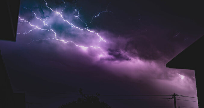 purple lighting thunder stom at night