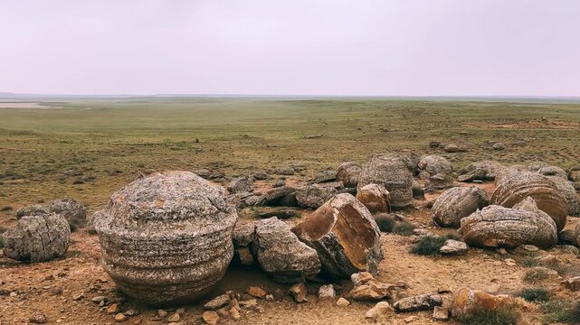 View of the valley of stone balls. Mangystau region.Unique natural places of Kazakhstan. Valley of the Balls. Spherical formations in the Torysh tract were formed about 120-180 million years ago. 4К