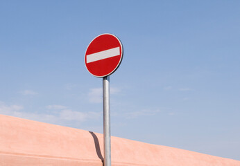 No entry traffic sign against blu sky