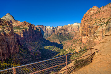 View of Pine Creek Canyon and surrounding cliffs from an overlook in Zion National Park, Utah.