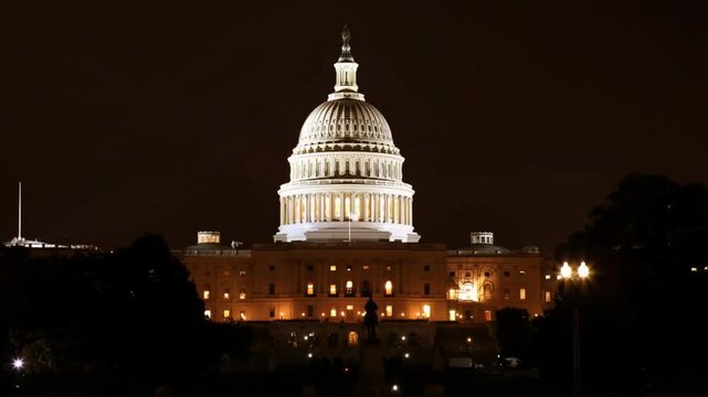 Iconic Night View of the U.S. Capitol Dome Illuminated Over Washington DC Skyline