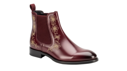 Isolated burgundy leather Chelsea boot featuring a floral design for formal fashion accessory